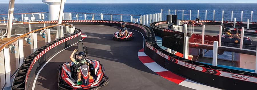 Guests racing on the Norwegian Encore Speedway